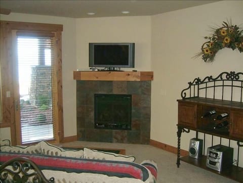 Living Room with Flatscreen TV, Stereo, fireplace, etc.