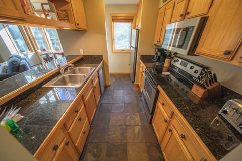 Fully equipped kitchen at this Condo