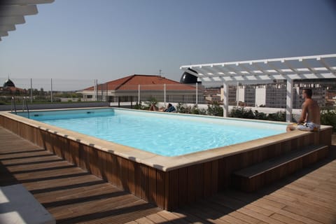 Get some sun in the outdoor pool.