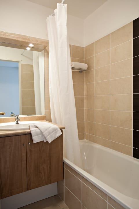 Get ready for your day in the lovely bathroom.