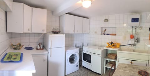 Fridge, oven, cookware/dishes/utensils