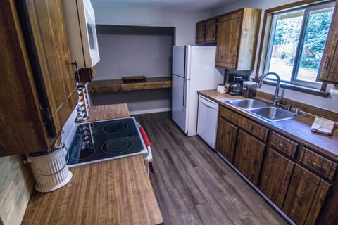 Kitchen: Full fridge, dishwasher, coffee bar area with coffee, sugar, tea, etc.