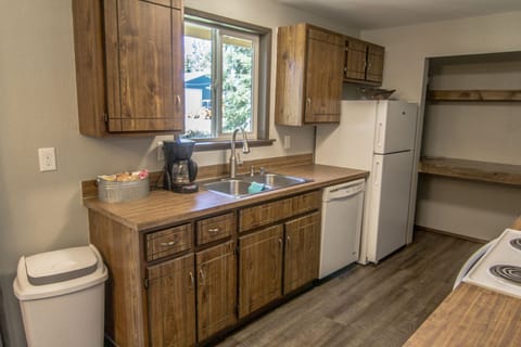 Kitchen: Coffee station includes drip coffee pot, coffee, tea, sugar, creamer, o