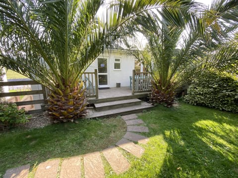 Own Entrance for the 4 bedroom Garden Apt from the BBQ Deck off the garden area.