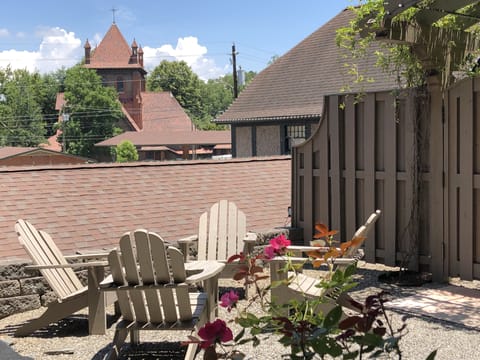 A private terrace overlooking The Cathedral of All Souls & Biltmore Estate prop.