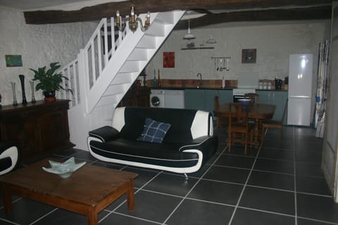 Le Pressoir sitting, dining and kitchen