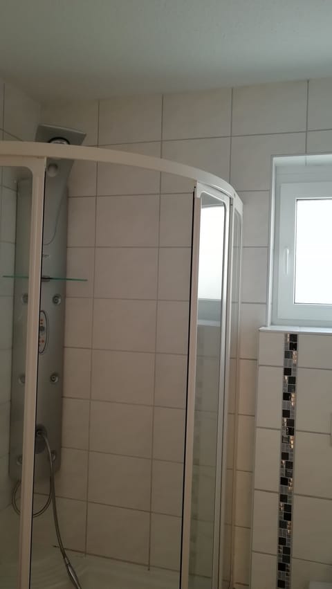 Combined shower/tub, hair dryer, towels, soap