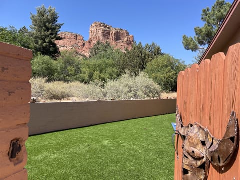 Side yard with chipping area and bocce ball court.