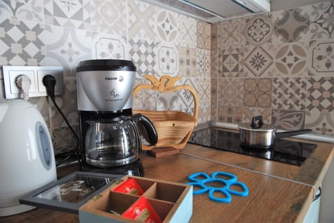 Fridge, microwave, coffee/tea maker, electric kettle