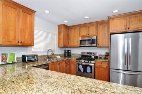 Gourmet Kitchen is Fully Stocked with Cookware and Serving Ware