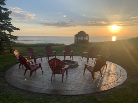 Beautiful stamped concrete fire pit patio over looking Lake Michigan.  
