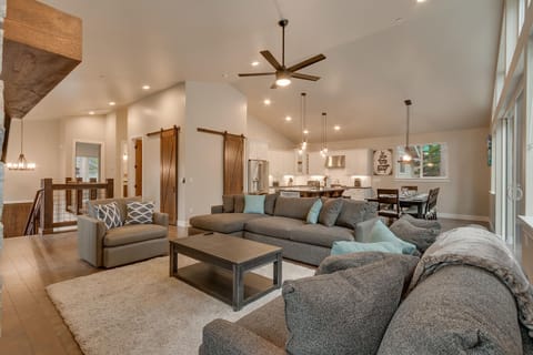 - Spacious living area open plan
- Barn doors add rustic charm
- Tahoe Airbnb with stylish design