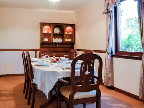 Dining area with fine view over the garden | Hazelmere, Rattray, near Blairgowrie