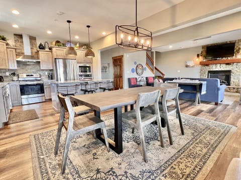 Solid dining table with extra seating