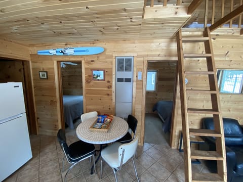 Cozy cabin all yours.  Two queen beds and sleeping loft. Walk to your beach!