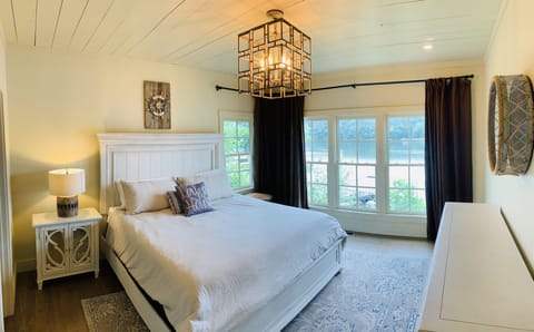 Master King Bed on Main Floor with direct view of the lake