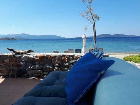 On the beach, sun loungers, beach towels