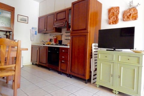 Fridge, oven, dishwasher, dining tables