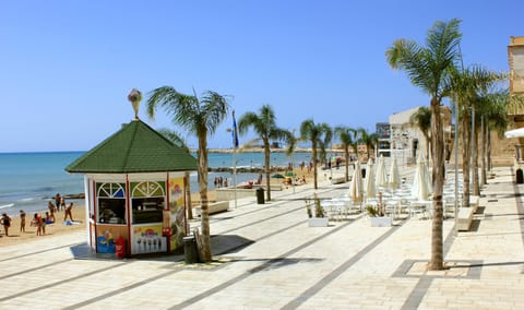 Beach nearby, sun loungers