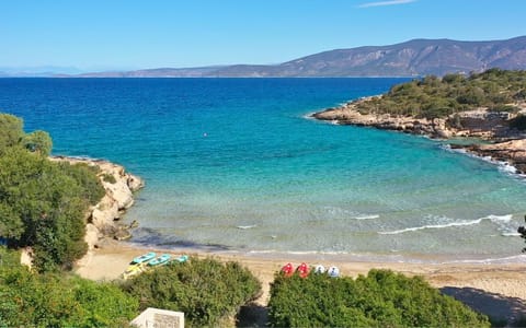 On the beach, sun loungers, beach towels