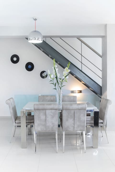 One of the dining tables made of marble..