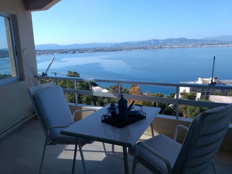 view from sitting room balcony over Corinth bay , city of Corinth and Loutraki