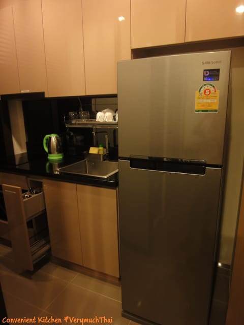 Fridge, microwave, coffee/tea maker, cookware/dishes/utensils