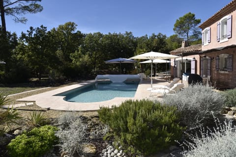 Outdoor pool, a heated pool, sun loungers