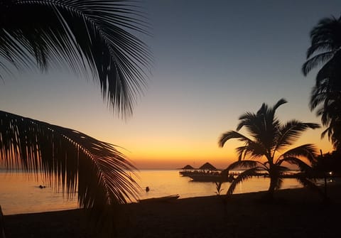 On the beach, sun loungers, beach towels