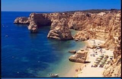 Beach nearby, sun loungers