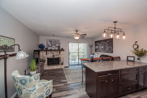 Open concept kitchen, dining and living area.
