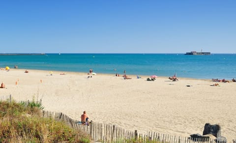 Beach nearby, sun loungers