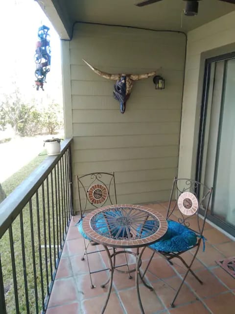 Seating for two on the patio.