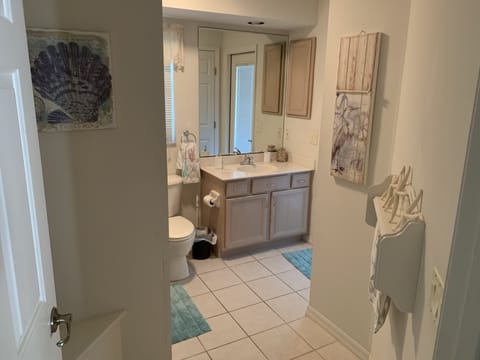 Combined shower/tub, hair dryer, towels, toilet paper