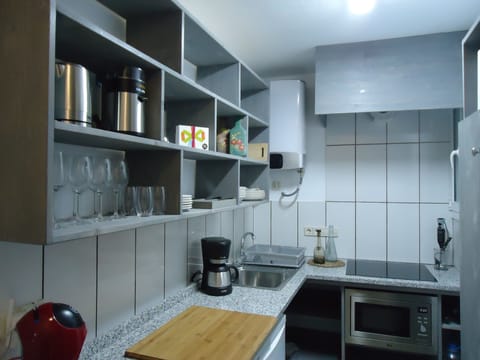 Fridge, microwave, coffee/tea maker, electric kettle