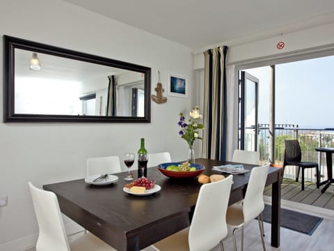 Dining area with access to balcony | Apartment 7 - Ocean 1 Apartments, Newquay