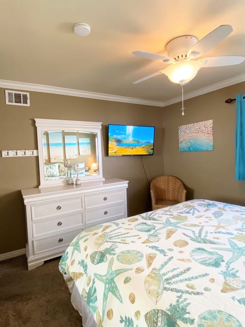 Second bedroom with Cal king bed, 43” Fire TV, mirrored closet, large dresser and blackout curtains!
