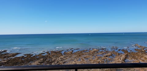 On the beach, sun loungers