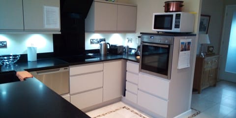 Modern kitchen with Neff oven, grill, and microwave
