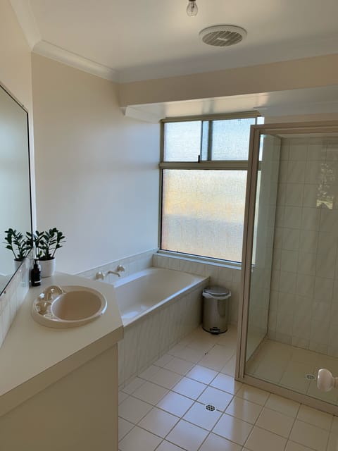 Bathroom | Combined shower/tub, towels, soap, toilet paper