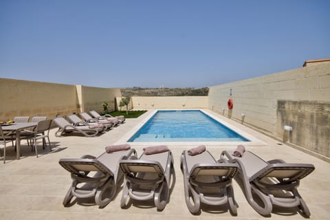 Outdoor pool, sun loungers