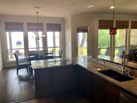 Kitchen with views of lake! Dining table and Bar top seating.