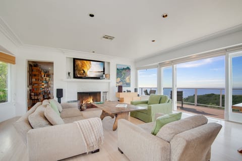 Spectacular open floor plan with 180 degree views of world famous Carbon Beach