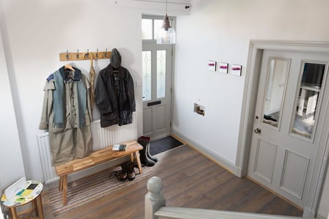 Shiloh Cottage - hallway with hanging space