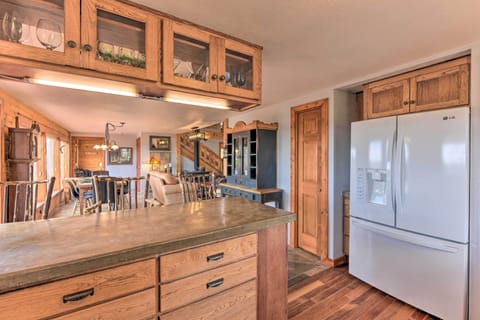 3 can sit at the breakfast bar.