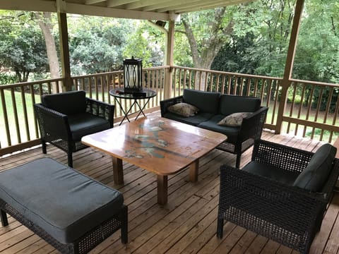 Covered deck with seating and tables