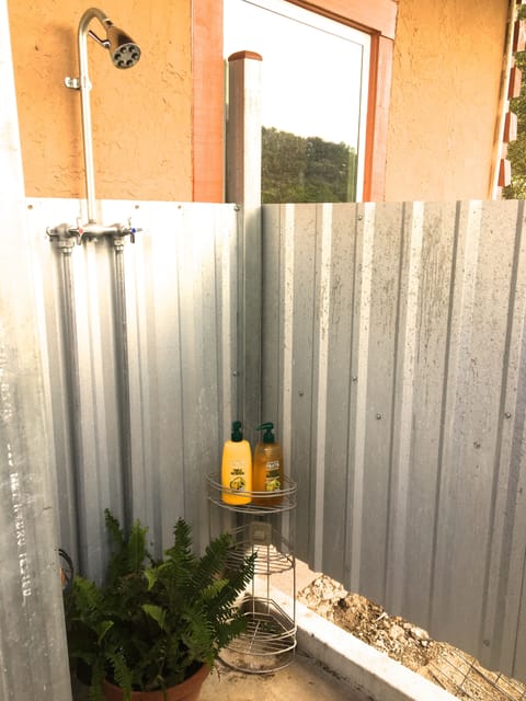 Outdoor shower. Take a shower outside while looking at the moon and stars!
