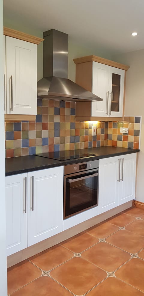 (kitchen with new oven and ceramic hob)