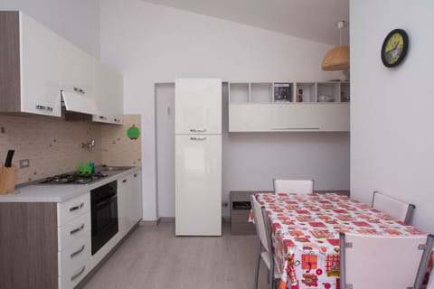 Fridge, oven, dining tables