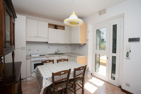 Fridge, oven, dining tables